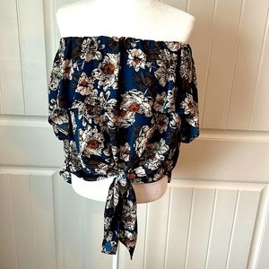 Ladies off the shoulder, floral blouse, ties in front, sz. L.